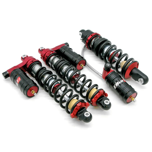 Set of shock absorbers with red and black design on a white background